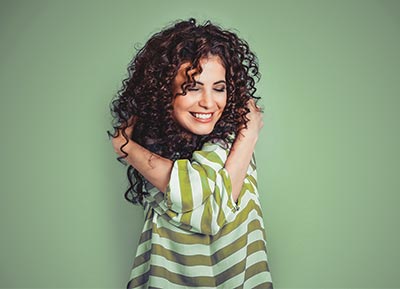 girl embracing herself
